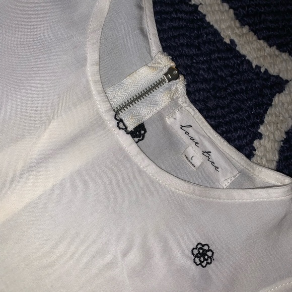 Cute dressy tank with black embroidery. - Picture 2 of 9